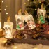 Batteriebetriebene beleuchtete Weihnachtsschneekugel Kerze